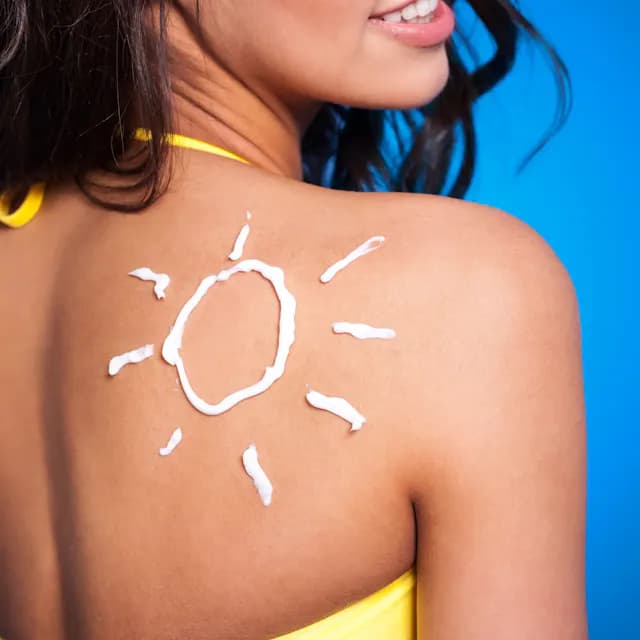 A sun drawn with sun protection cream